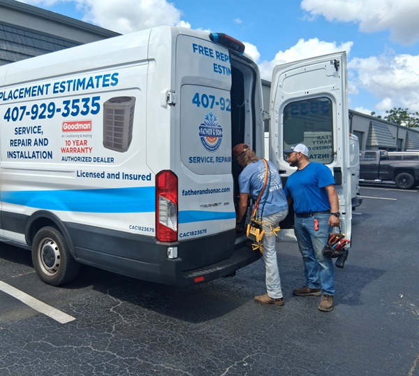 Jon Luke Ventresca and a Father and Son technician unloading tools from the service van on a same-day AC call in Orlando